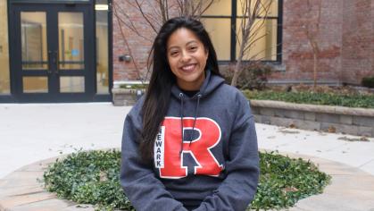 A student wearing a Rutgers Newark sweatshirt